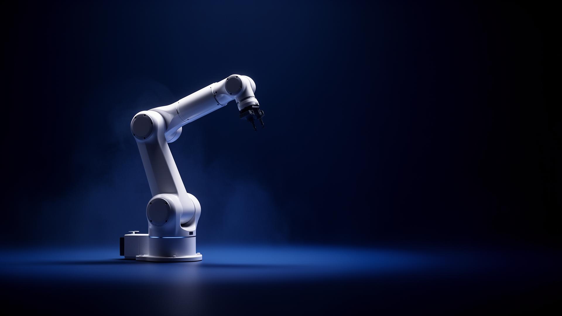 A precision robotic arm at rest under controlled studio light
